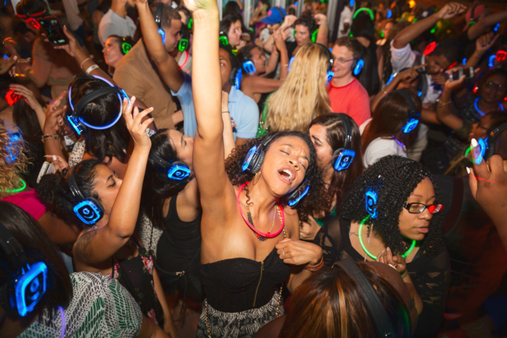 People partying with the crystal-clear silent disco headsets from BIYU