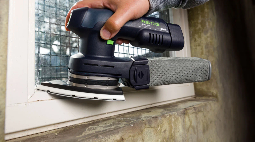 Rent Festool cordless delta sander to sand wooden window frames. Easy and affordable rental with BIYU