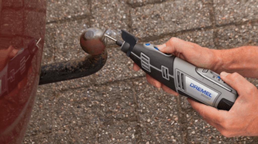 Dremel cordless Multi-tool 12V Li-ion used to remove rust from a towing hook. Affordable rental with BIYU.