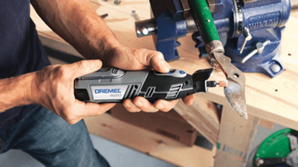 Dremel cordless Multi-tool 12V Li-ion repairing other tools. Affordable rental with BIYU.