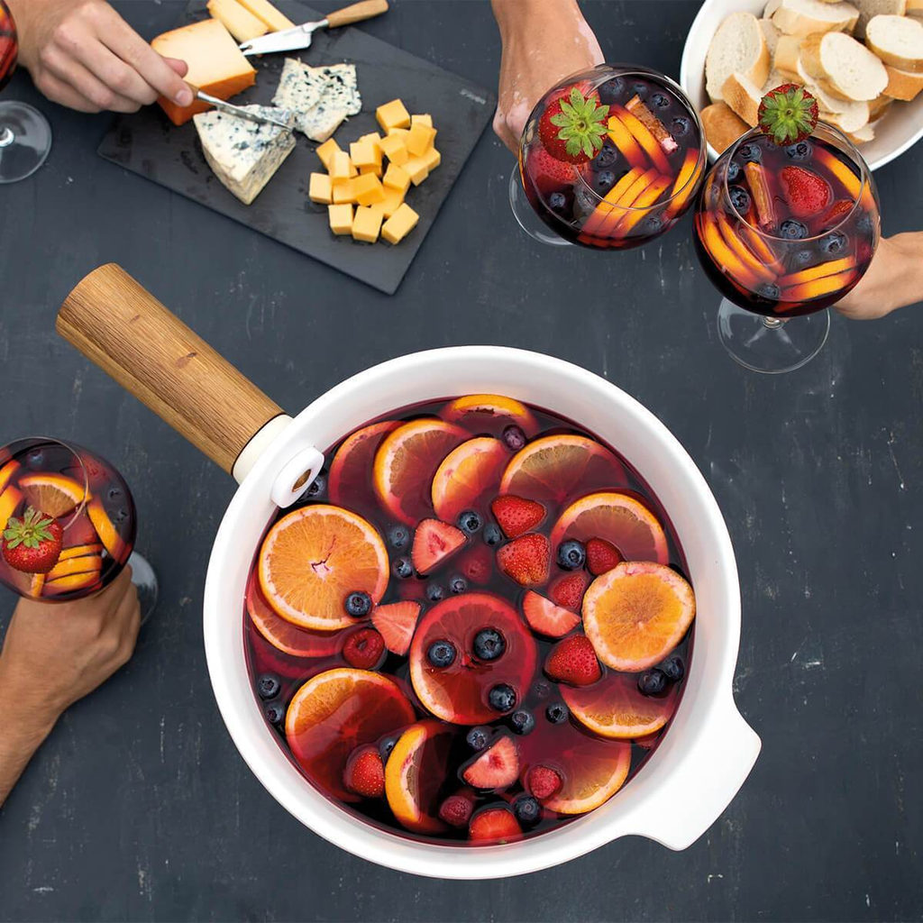 Boska mulled wine at a party. Affordable rental with BIYU.