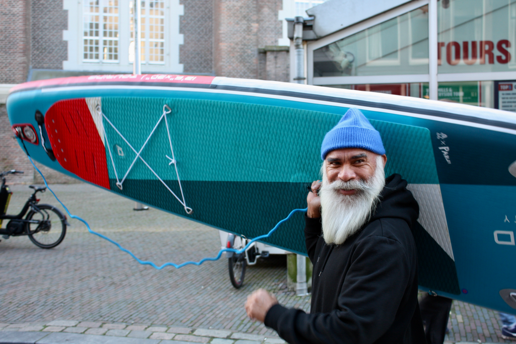 Paddle on Amsterdam channels with Starboard SUP from BIYU affordable rental
