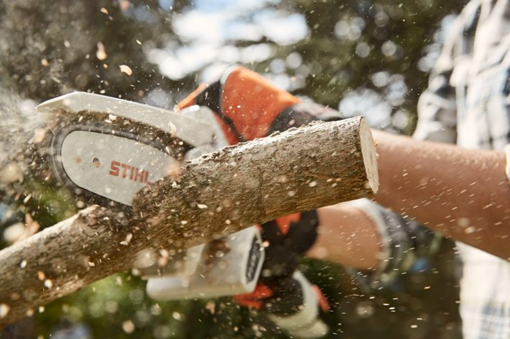For pruning trees and shrubs and building tree forms use STIHL cordless chainsaw pruner